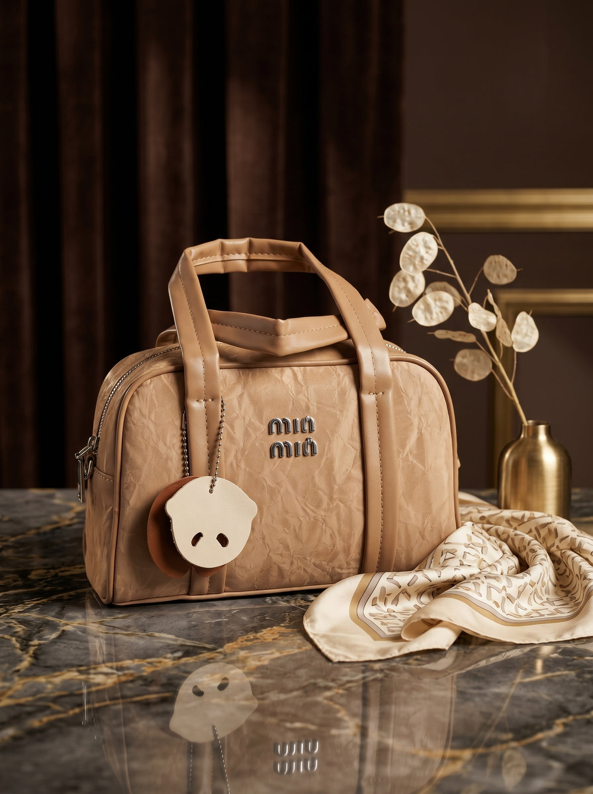 MIU MIU CARAMEL BOWLER
